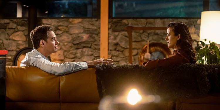 Michael Weatherly looking across at Cote de Pablo in NCIS: Tony & Ziva