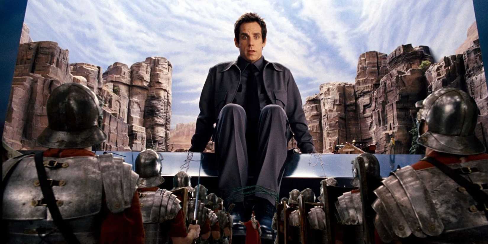 Ben Stiller as Larry Daley with his feet tied, looking down at an army of tiny soldiers in Night at the Museum.