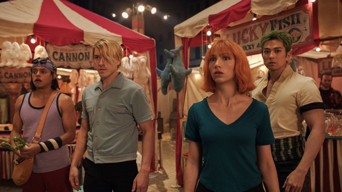 One Piece Season 2 Cast standing among the booths of Loguetown