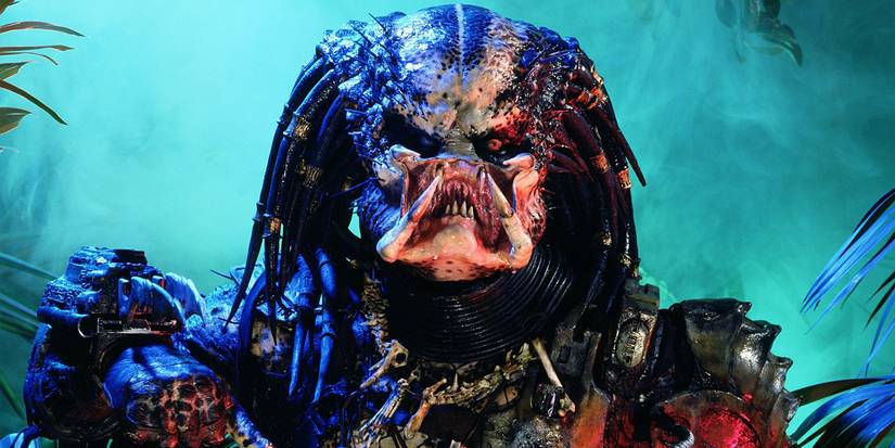 The Predator, in the jungle at night, ready for battle in Predator (1987)