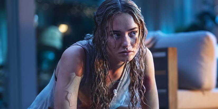 Johnny Sequoyah crouched down, head tilted, looking off to the side in Primate.