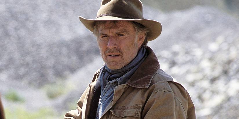 Robert Redford wearing a hat outdoors in An Unfinished Life
