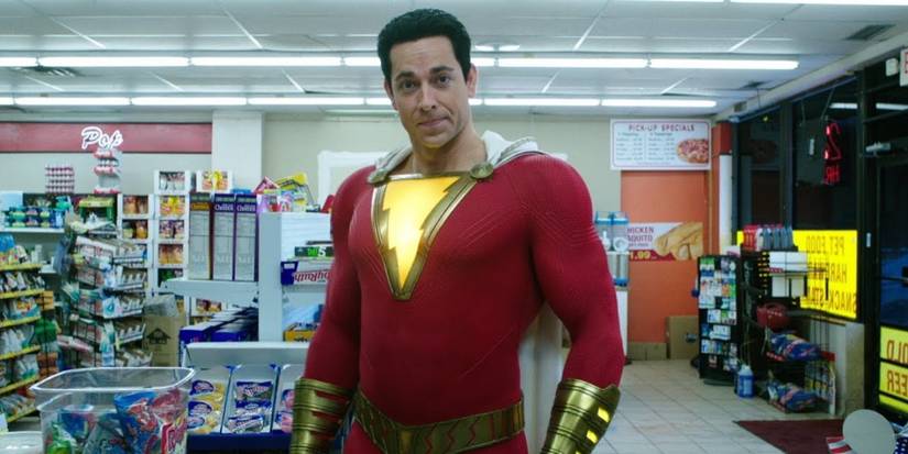 Shazam (Zachary Levi) stands at the convenience store counter in Shazam! (2019).