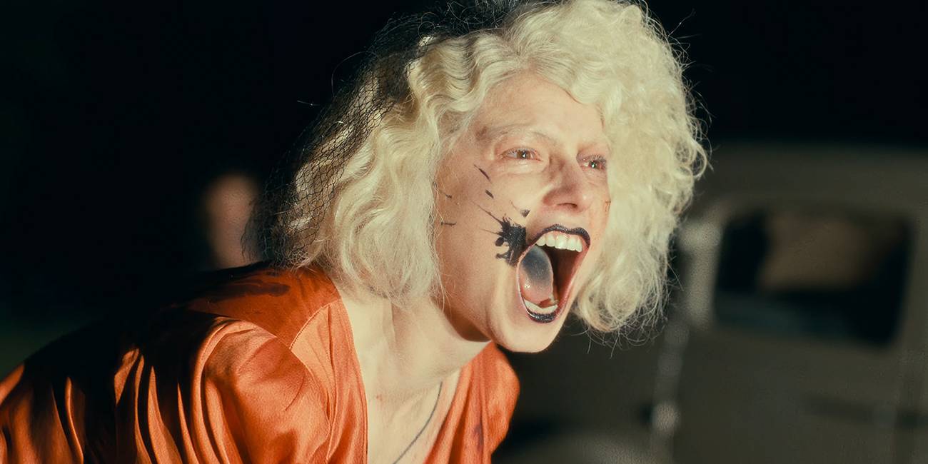 Jessie Buckley screams at something off-screen in The Bride!