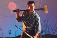 Bruce Campbell as Ash Williams in a promotional image for the first Evil Dead movie, released in 1981