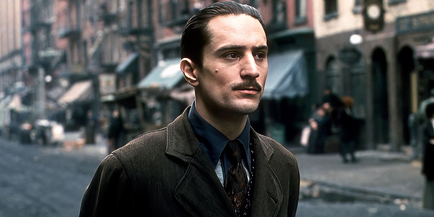 Robert De Niro walks the streets in The Godfather II