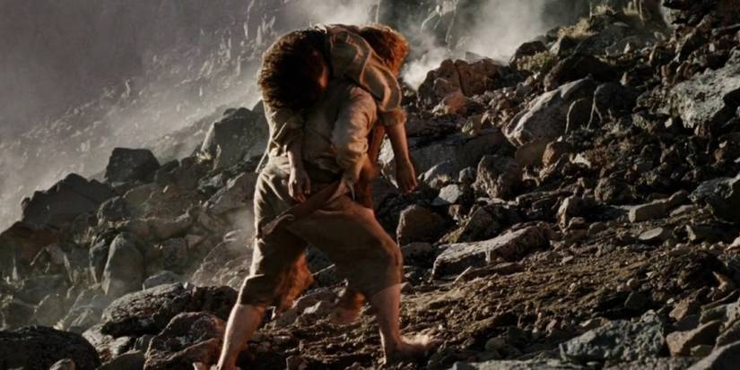 Samwise carrying Frodo up Mt. Doom in The Lord of the Rings: The Return of the King (2003)