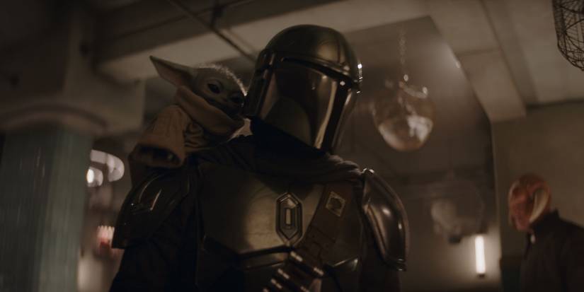 The Mandalorian, Din Djarin (Pedro Pascal), and Grogu investigate a building in 'The Mandalorian and Grogu'