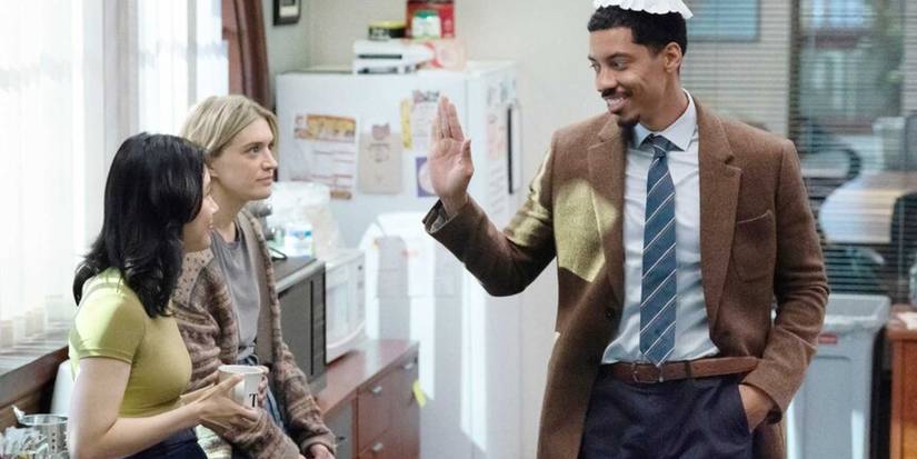 Detrick high fives Nicole as Mare watches in The Paper