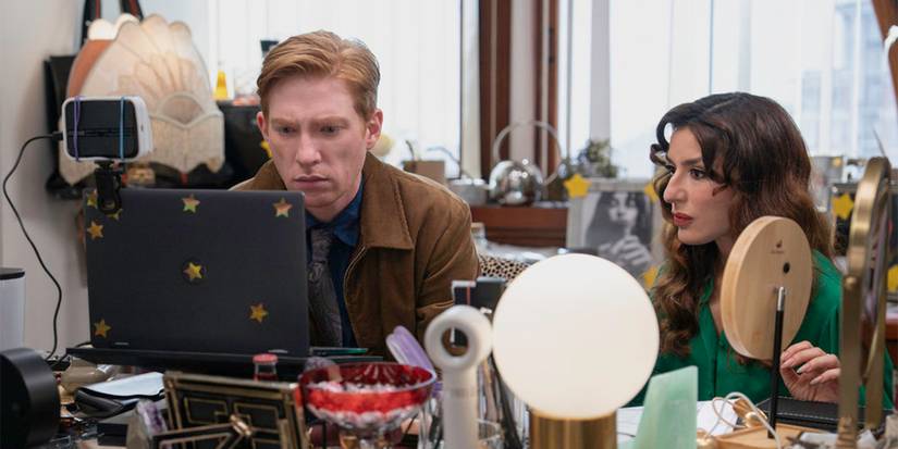 Domhnall Gleeson and Sabrina Impacciatore as Ned and Esmeralda in a scene from The Paper