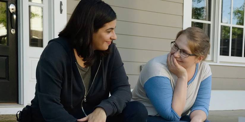 Alanna Masterson as Tara Chambers and Merritt Wever as Denise Cloyd talking on 'The Walking Dead.'