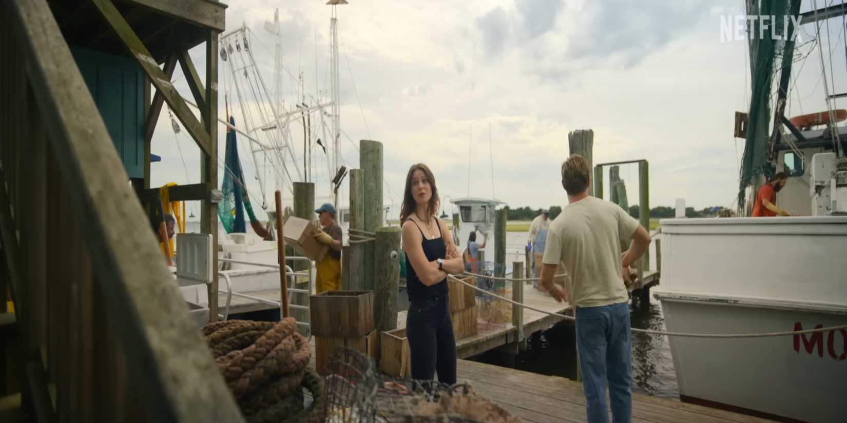 Melissa Benoist and Jake tired in a scene from the seafront on Netflix