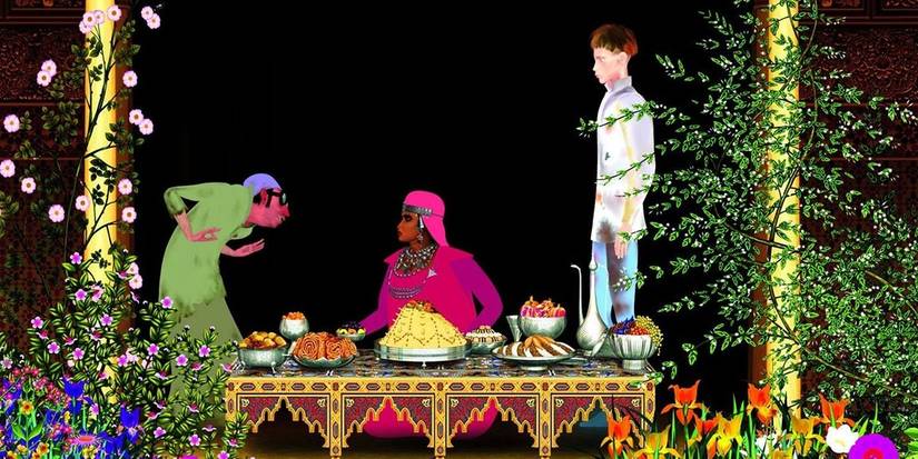 Three people at a dinner table in 'Azur & Asmar the Princes' Quest'