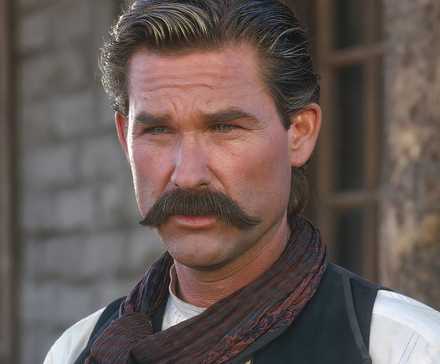 Kurt Russell as Wyatt Earp squints his eyes in 'Tombstone'