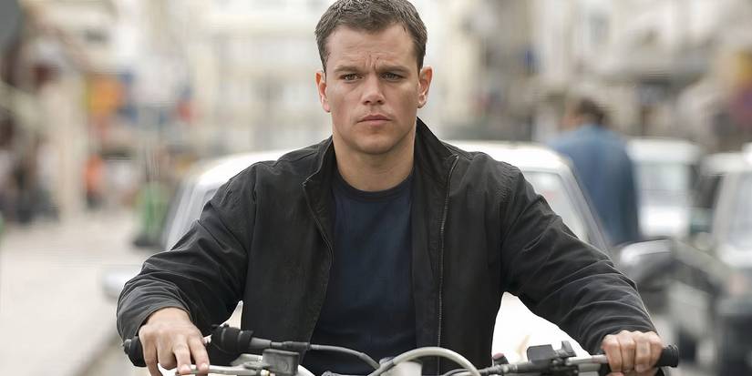 Matt Damon riding on a motorcycle in The Bourne Ultimatum