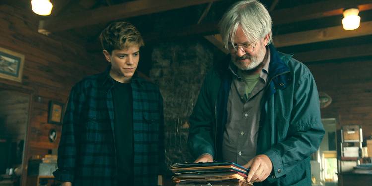 Alex Dempsey (Mae Martin) with an older man in 'Wayward'