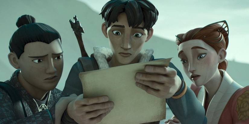 Drew, Hector, and Gretchen look over a piece of paper.
