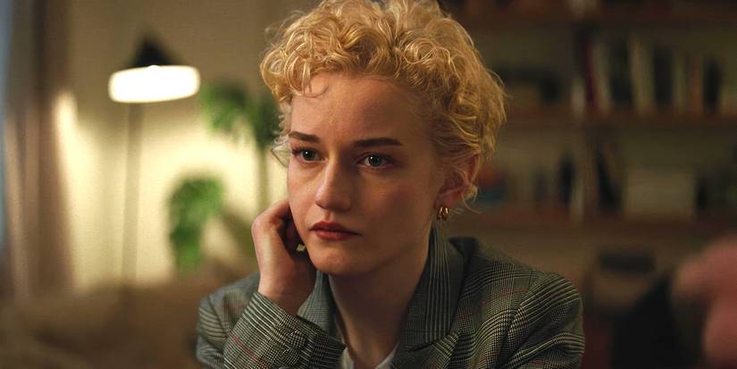 Julia Garner looking worried in Wolf Man