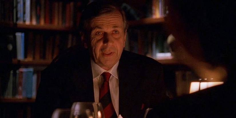 The Cigarette Smoking Man (William B. Davis) at dinner with Dana Scully (Gillian Anderson) in 'The X-Files' episode "En Ami."