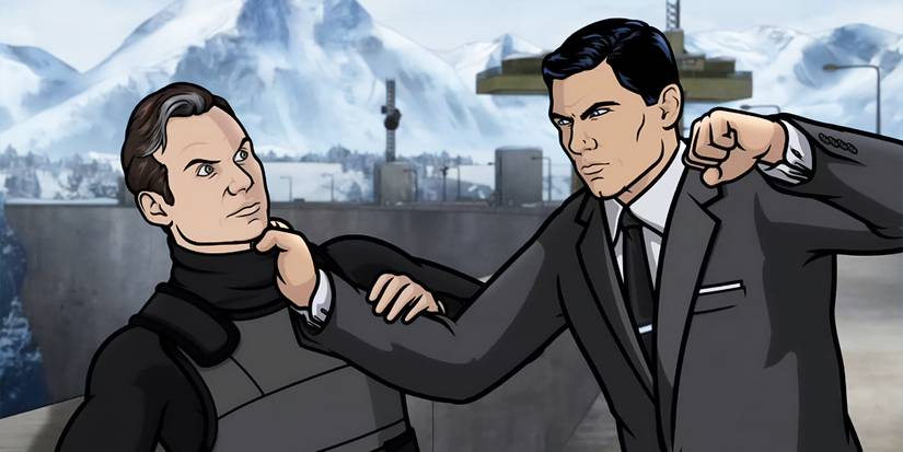 Archer holds someone by the neck and prepares to punch him in a scene from Archer on FX.