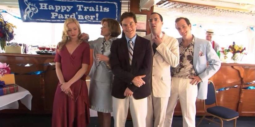 The cast pose together at a boat party in the pilot episode of Arrested Development.