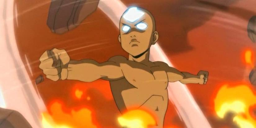 Aang with glowing eyes and symbol on his forehead with moving objects in Avatar: The Last Airbender.