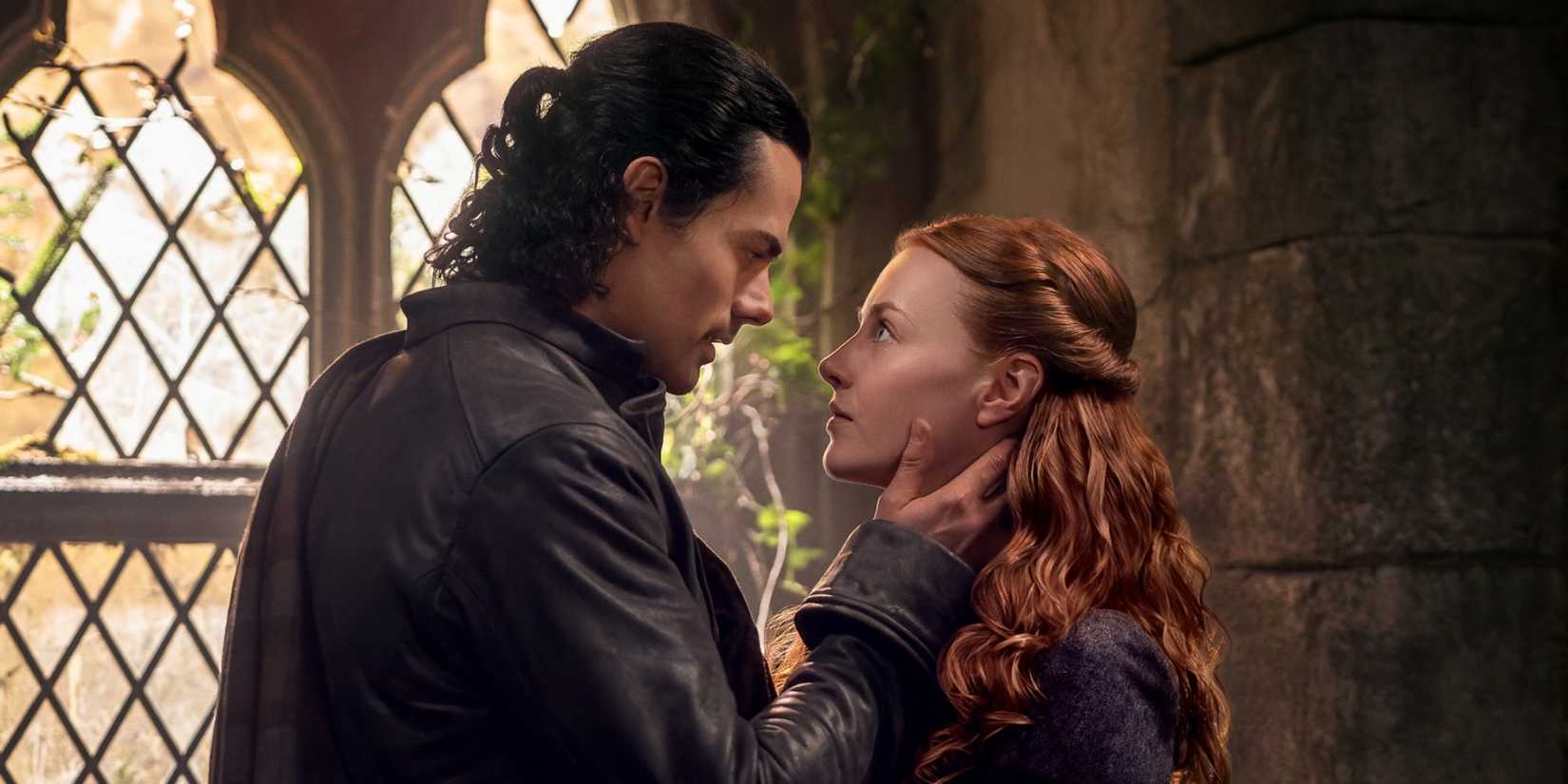Jamie Roy as Brian with a hand on the side of the neck of Harriet Slater as Ellen in Outlander: Blood of My Blood