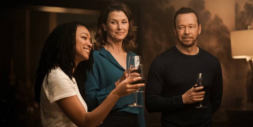 Boston Blue - Lena Silver (Sonequa Martin-Green) drinks wine with Erin (Bridget Moynahan) and Danny Reagan (Donnie Wahlberg)