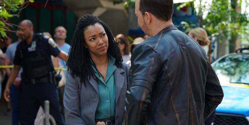 Boston Blue - Lena Silver (Sonequa Martin-Green) talks to Danny Reagan (Donnie Wahlberg)