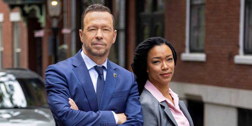 Donnie Wahlberg as Danny Reagan leaning on Sonequa Martin-Green as Lena Silver in Boston Blue