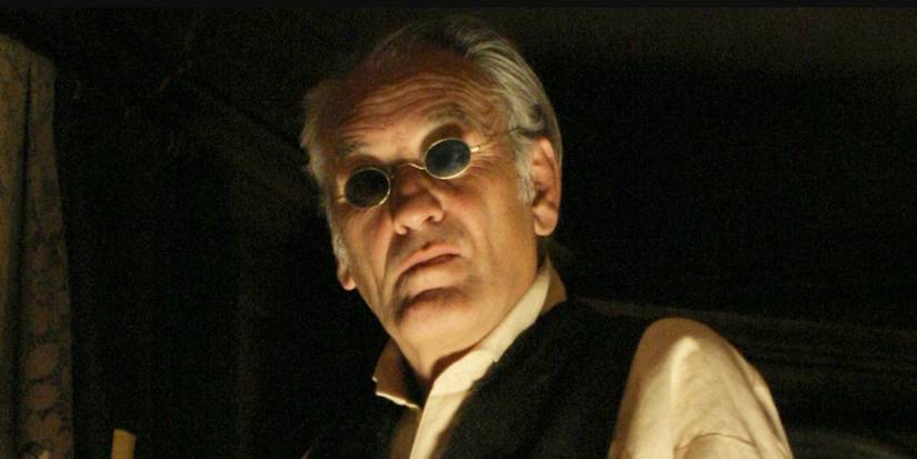 Lodz stands in the darkness in Carnivale.