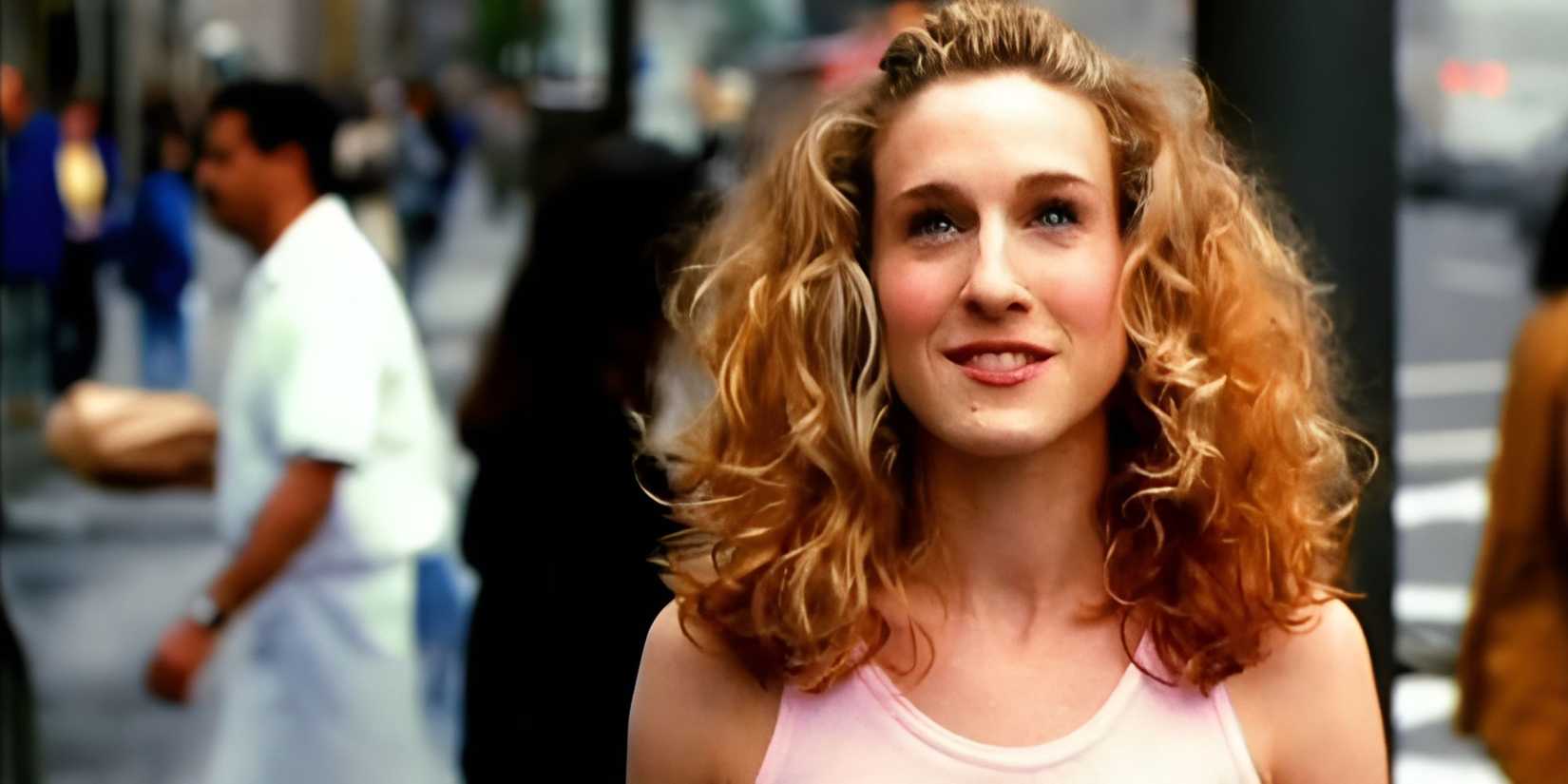 Sarah Jessica Parker as Carrie Bradshaw walking in NYC in iconic tutu dress in Sex and the City intro.