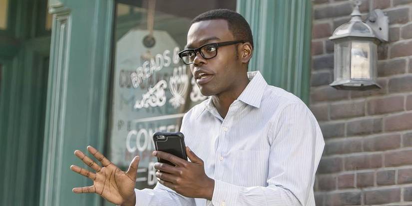 William Jackson Harper as Chidi freaking out with his hands out in The Good Place.