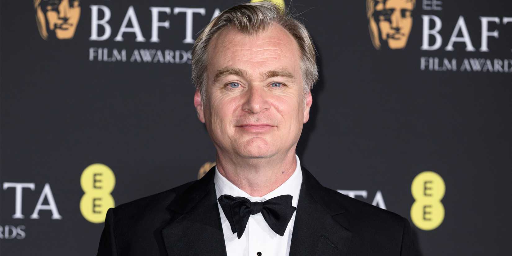 Christopher Nolan on the red carpet at the BAFTAs