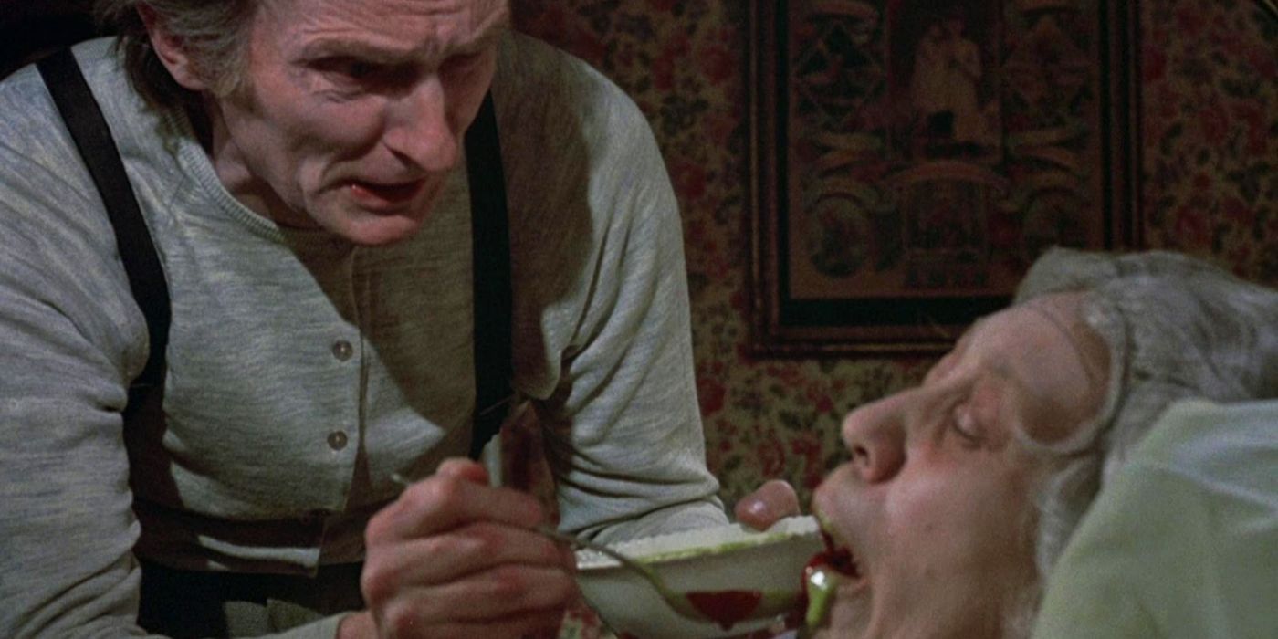 Roberts Blossom as Ezra Cobb feeding his dead mother in Deranged: Confessions of a Necrophile,