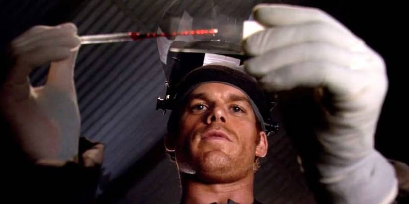 Michael C. Hall as Dexter Morgan piping a blood sample in the pilot episode of 'Dexter'.