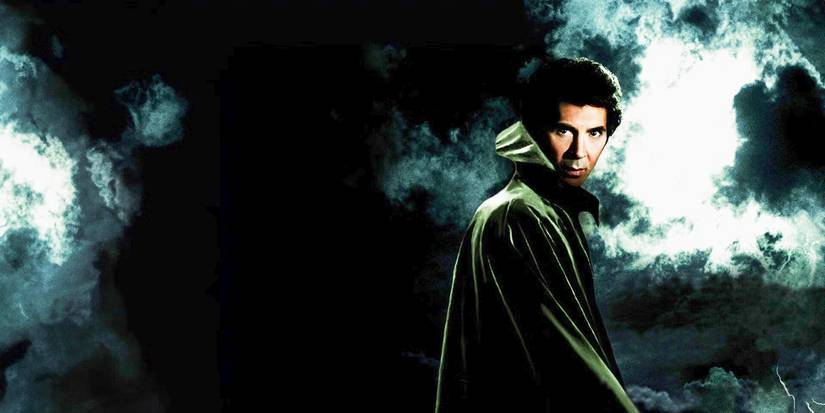 Frank Langella's Dracula standing against a foggy background in the 1979 Dracula