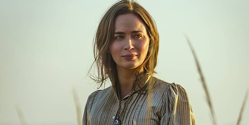 Emily Blunt in historic clothing looking to the side in a field in a scene from Prime Video's The English.