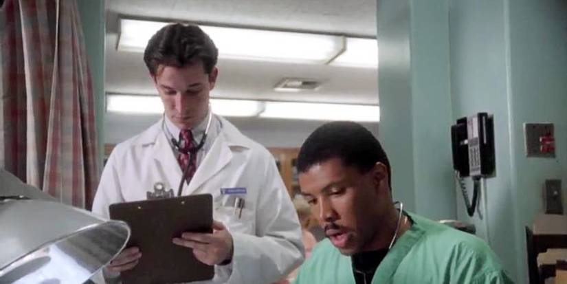 John Carter and Peter Benton treating a patient in the pilot episode of ER