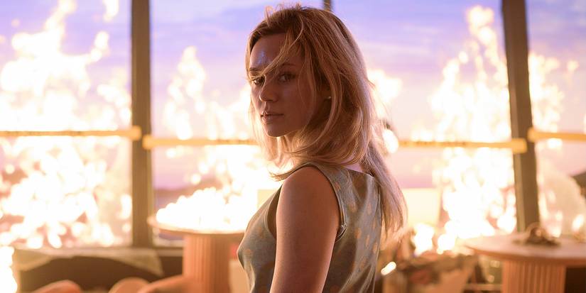 A woman stands in a burning skyscraper in Final Destination Bloodlines (2025)