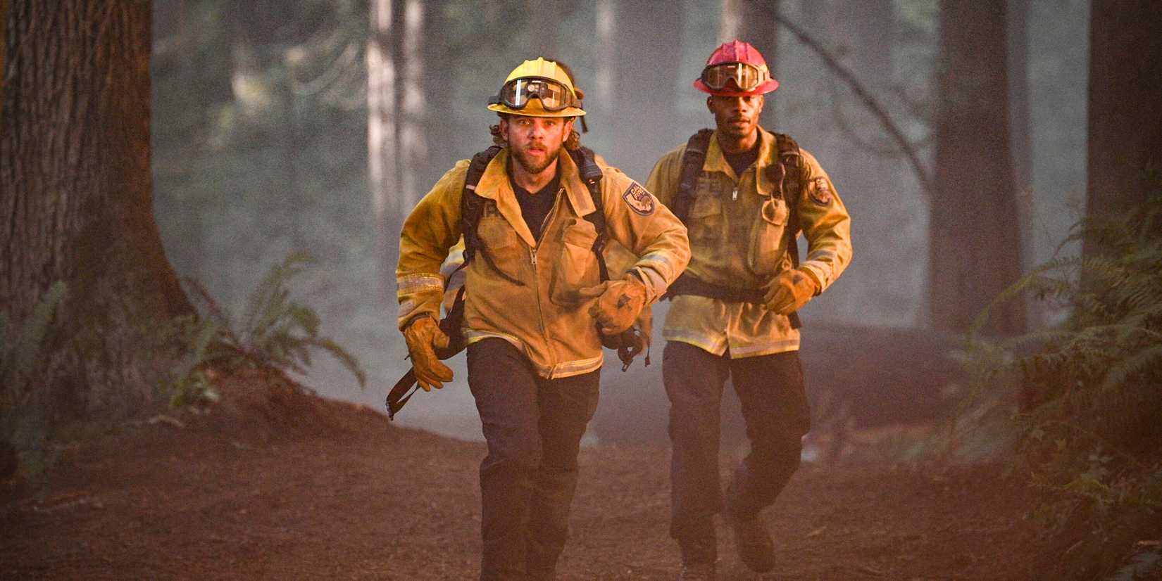 Max Thieriot as Bode and Jordan Calloway as Jake in Fire Country