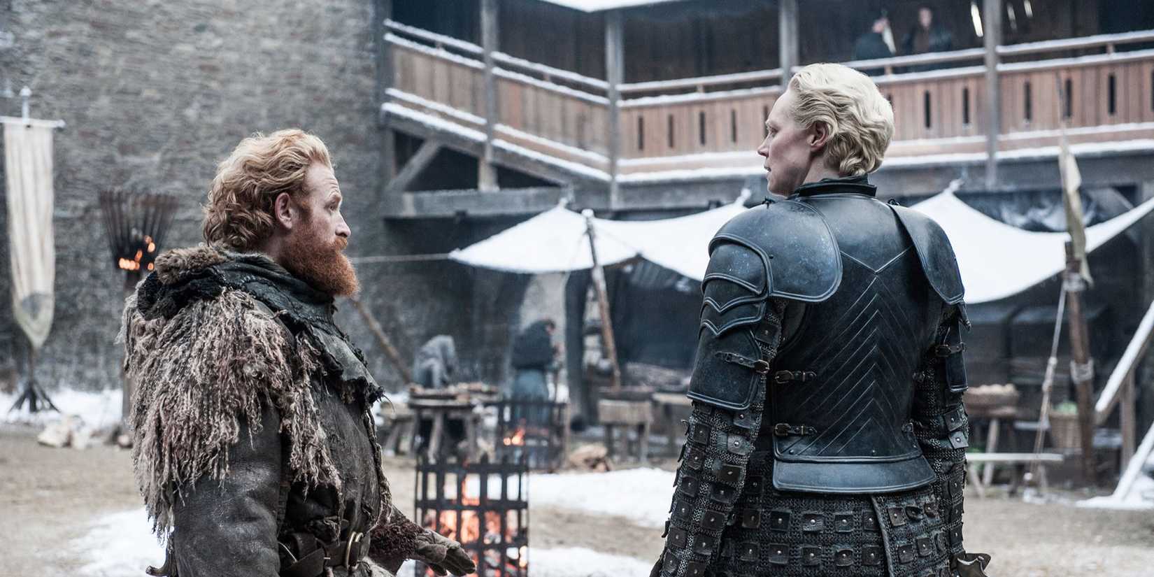 Gwendoline Christie as Brienne talks with Kristofer Hivju as Tormund Giantsbane in Game of Thrones.