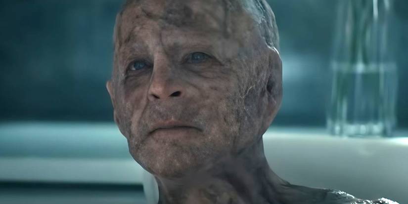 Ethan Slater as Thomas Godolkin with warped skin looking ahead seriously in Gen V Season 2.