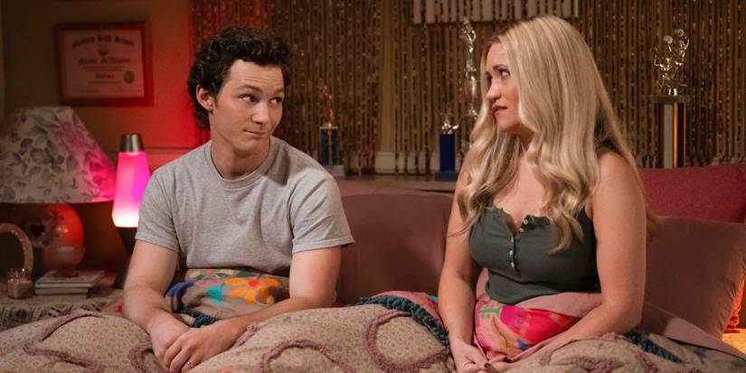 Georgie and Mandy sit in bed together in Georgie & Mandy's First Marriage Season 2