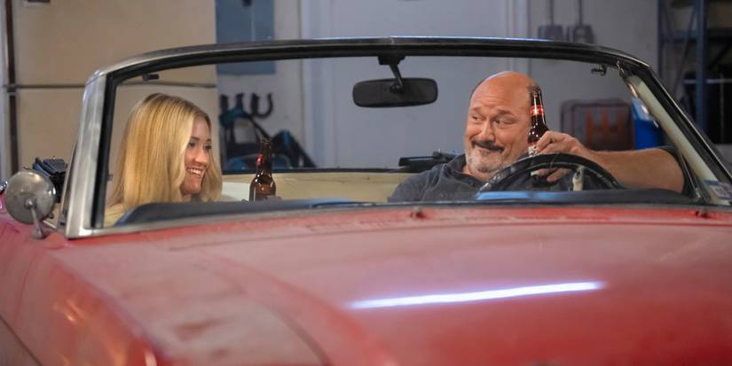 Jim and Mandy sitting together in a car in Georgie & Mandy's First Marriage Season 2