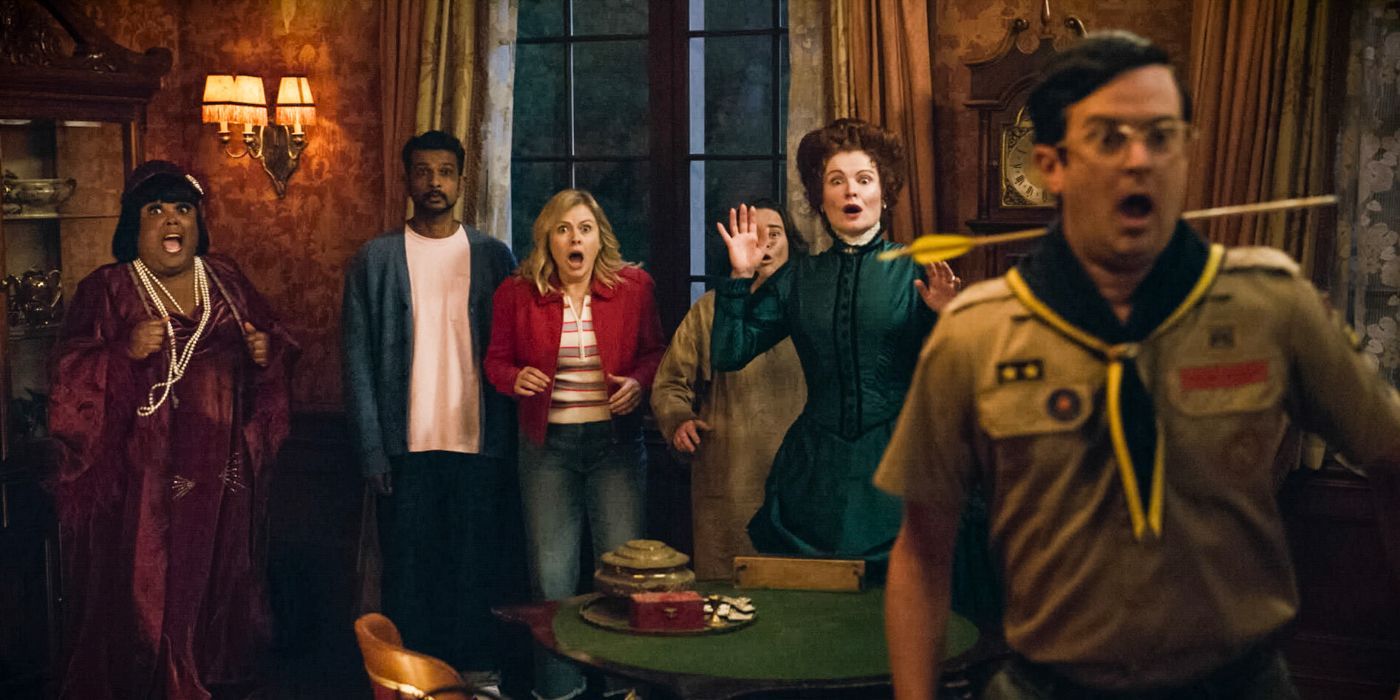 Ghosts Season 5 ensemble standing in the basement