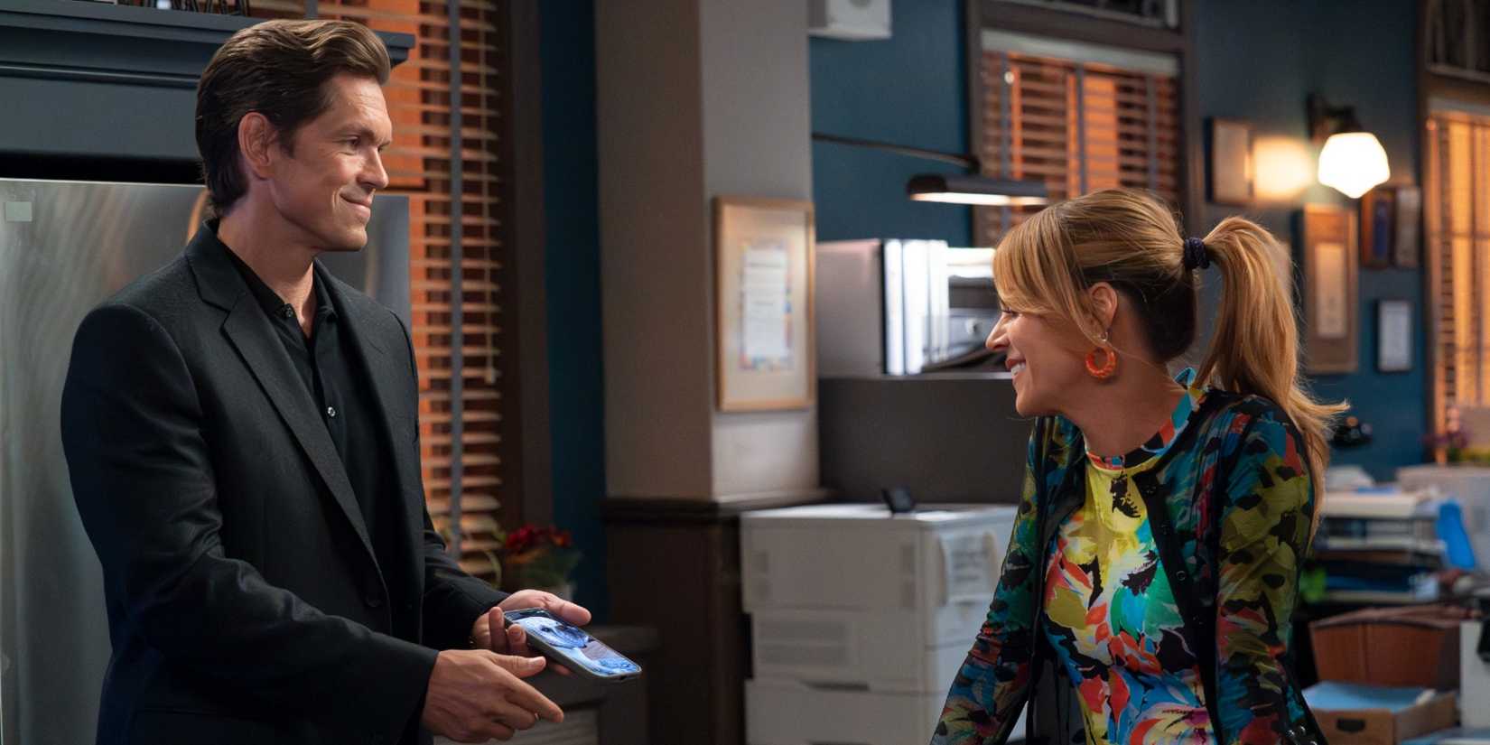 Nick Wagner showing Morgan Gillory his phone in High Potential Season 2