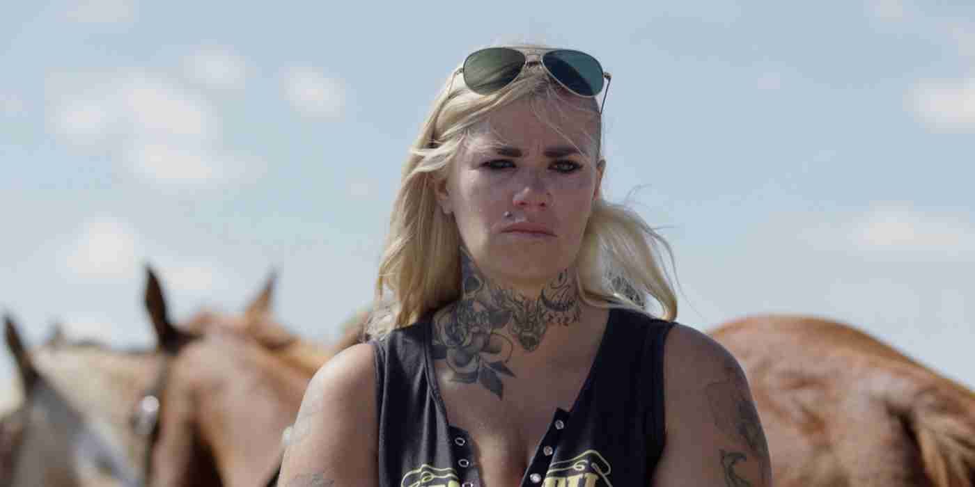 Tabatha Zimiga looks grief-ridden as she stares into the distance in 'East of Wall'
