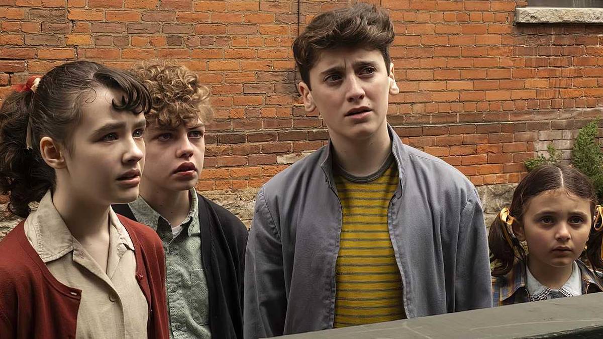 Kids of IT: Welcome to Derry look up at a counter