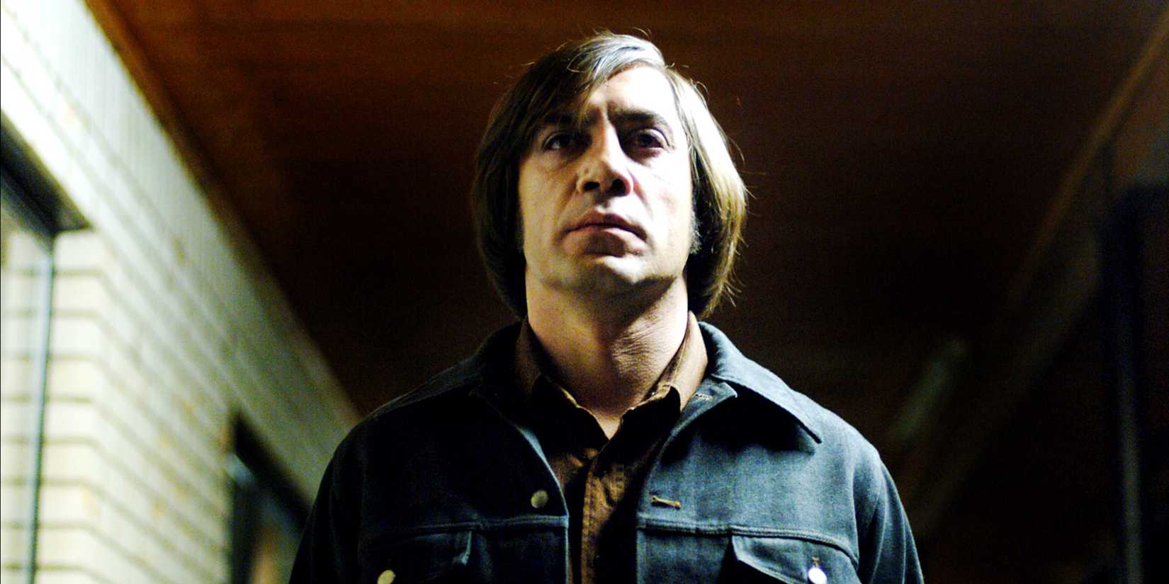 Javier Bardem standing firmly in No Country for Old Men